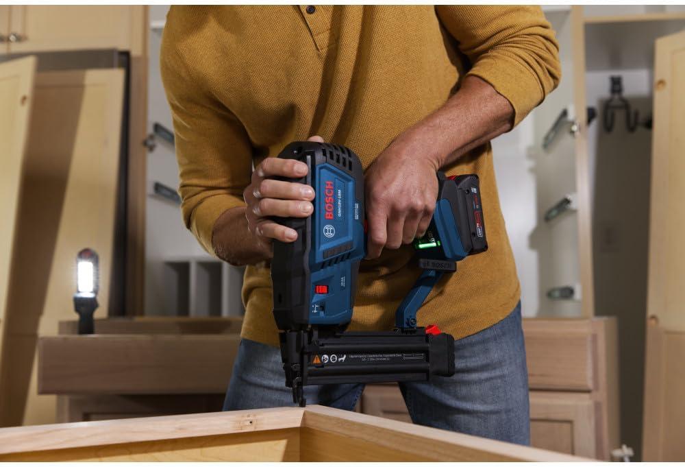 imageBOSCH GNH18V18MN 18V Brushless 18Gauge Brad Nailer Cordless Power Fastens up to 2000 Nails per Charge OneHanded Activation ToolFree Jam Clearing Double LED Light Bare ToolIndustrial